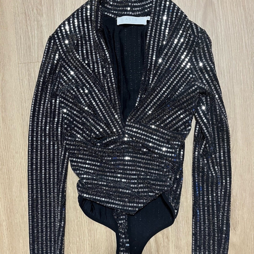 Shimmery black deep cut bodysuit